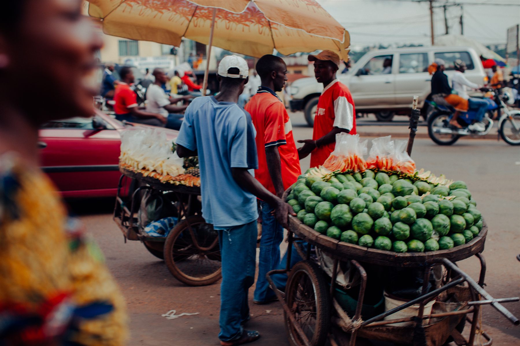 Street market with a watermelon seller