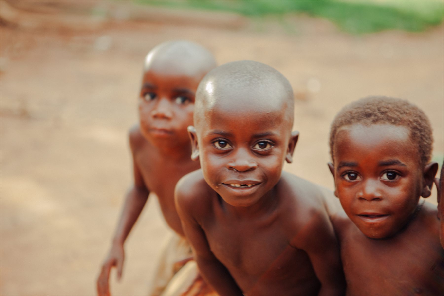Three children facing the camera